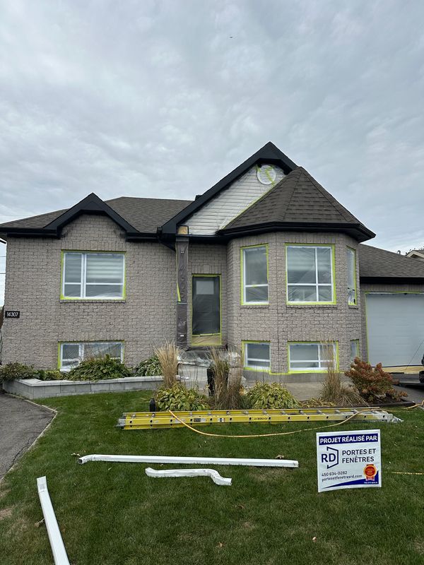 Professional spray painted home exterior in Alberta